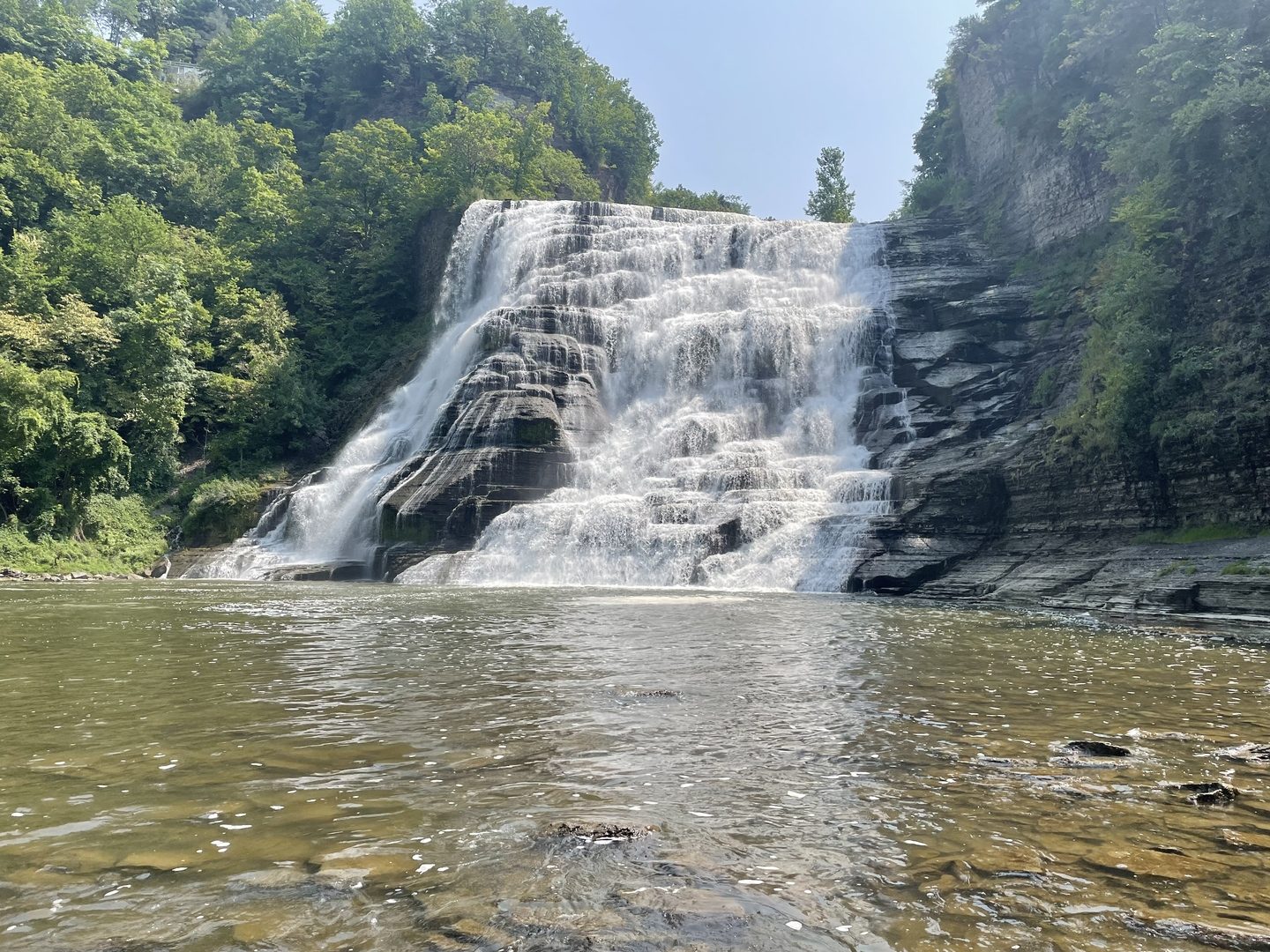 A waterfall in a wooded Southern Tier landscape.